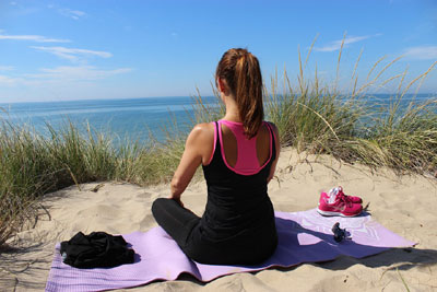 Girl doing Mindfulness Meditation To Reduce Stress